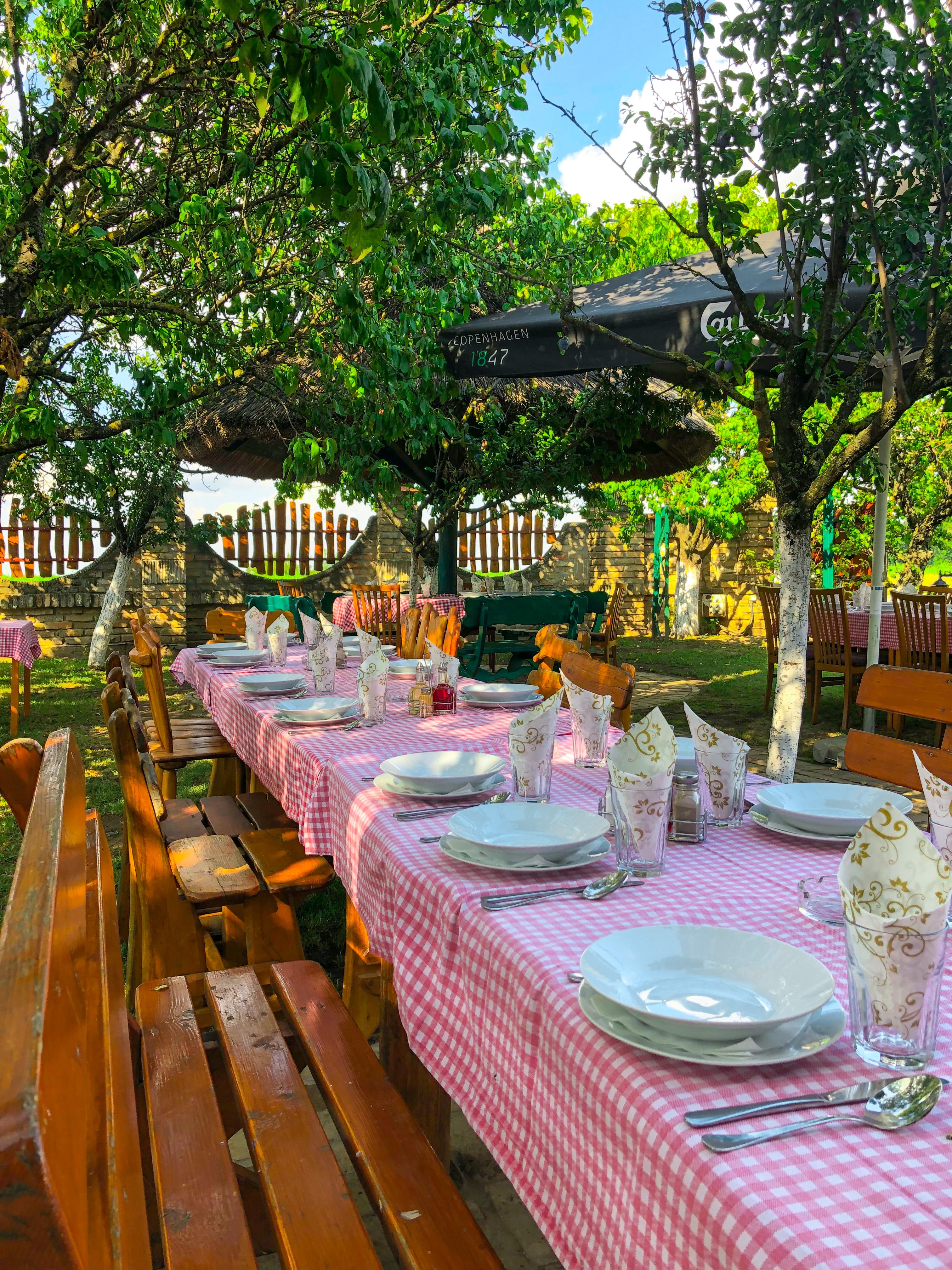 Freshly baked homemade bread on a flour-dusted wooden surface